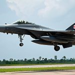 **

A modern Thai Air Force fighter jet launching countermeasures during an electronic warfare engagement. Focus on the technological aspects: radar jamming, missile defense systems, and AI-powered threat analysis. Background includes complex digital displays and data streams. Emphasize Thailand's advanced EW capabilities.

**